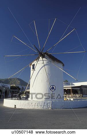 Paros, windmill, Greek Islands, Parikia, Cyclades, Greece, Europe, Windmill with thatched roof along the waterfront in the town of Parikia on Paros Island. View Large Photo Image Stock Photo - Paros, windmill, Greek Islands, Parikia, Cyclades, Greece, Europe, Windmill with thatched roof along the waterfront in the town of Parikia on Paros Island.. Fotosearch