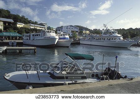Stock Image -  passenger ferry, Virgin Islands National Park, St. John, U. S. Virgin Islands, Caribbean, USVI, The Virgin Islands Nat'l Park Dock on Cruz Bay on Saint John Island.. Fotosearch