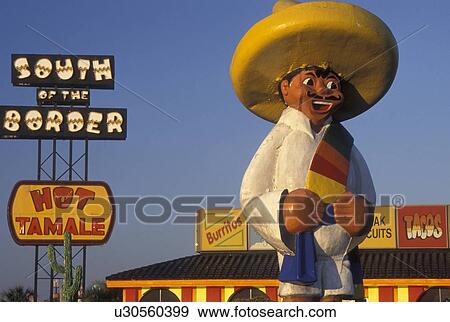 Stock Photo -  Pedro, South of the Border, SC, South Carolina, NC, Statue of Pedro at the South of the Border off of I-95 the South Carolina and North Carolina border.. Fotosearch