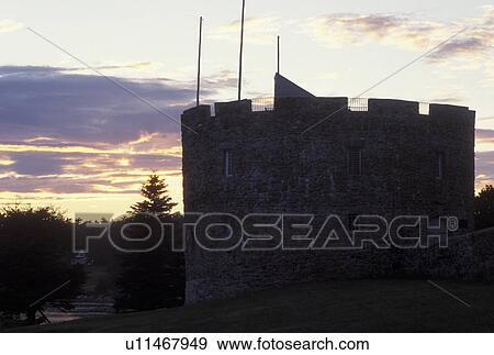 Stock Photo -  Pemaquid Point, ME, Maine, Pemaquid Area, Colonial Pemaquid State Historic Site and Fort William Henry at sunset at Pemaquid Point.. Fotosearch