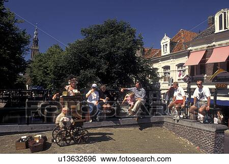 pipe organ, street musician, Holland, Edam, Netherlands, Noord-Holland, Europe, Woman playing a pipe organ in the city of Edam. View Large Photo Image Stock Photograph - pipe organ, street musician, Holland, Edam, Netherlands, Noord-Holland, Europe, Woman playing a pipe organ in the city of Edam.. Fotosearch