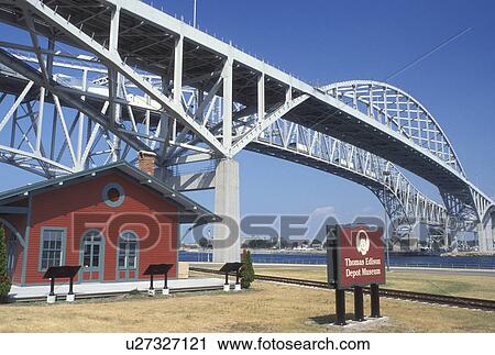 Port Huron, MI, Lake Huron, Michigan, Thomas Edison Depot Museum below the Blue Water International Bridge which spans the St. Clair River at Port Huron. View Large Photo Image Stock Image - Port Huron, MI, Lake Huron, Michigan, Thomas Edison Depot Museum below the Blue Water International Bridge which spans the St. Clair River at Port Huron.. Fotosearch