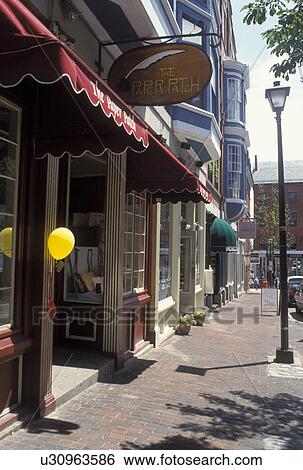 Stock Photograph -  Portland, ME, Maine, Shops along the street in downtown Portland.. Fotosearch