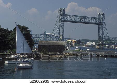 Portsmouth, NH, New Hampshire, Boats docked along the Piscataqua River in Portsmouth. View of Memorial Bridge crossing the Piscataqua River. View Large Photo Image Stock Photography - Portsmouth, NH, New Hampshire, Boats docked along the Piscataqua River in Portsmouth. View of Memorial Bridge crossing the Piscataqua River.. Fotosearch