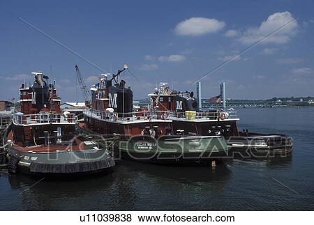 Portsmouth, NH, New Hampshire, The Tuggs, tugboats docked along the Piscataqua River in Portsmouth. View Large Photo Image Stock Photo - Portsmouth, NH, New Hampshire, The Tuggs, tugboats docked along the Piscataqua River in Portsmouth. . Fotosearch