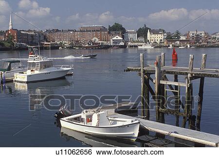 Stock Photograph -  Portsmouth, NH, New Hampshire, View of boats docked along the Piscataqua River in Portsmouth.. Fotosearch