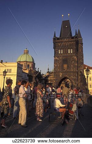 Prague, Charles Bridge, Czech Republic, Praha, Central Bohemia, Street artist on Charles Bridge. View Large Photo Image Stock Photo - Prague, Charles Bridge, Czech Republic, Praha, Central Bohemia, Street artist on Charles Bridge.. Fotosearch