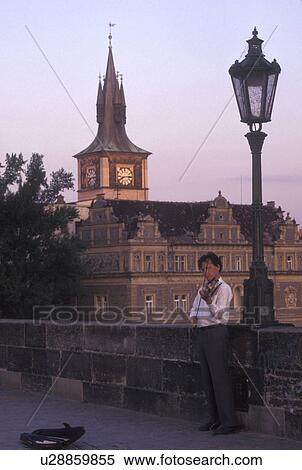 Prague, Charles Bridge, Czech Republic, Praha, Central Bohemia, Street musician plays his violin on Charles Bridge. View Large Photo Image Stock Photography - Prague, Charles Bridge, Czech Republic, Praha, Central Bohemia, Street musician plays his violin on Charles Bridge.. Fotosearch