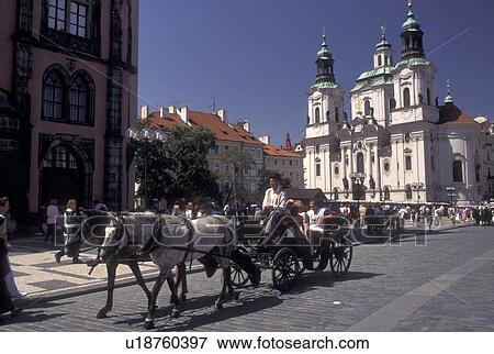 Prague, horse drawn carriage, Czech Republic, Praha, Central Bohemia, St. Nicholas Church, Carriage tour through Old Town Square in the city of Prague. View Large Photo Image Stock Photo - Prague, horse drawn carriage, Czech Republic, Praha, Central Bohemia, St. Nicholas Church, Carriage tour through Old Town Square in the city of Prague.. Fotosearch