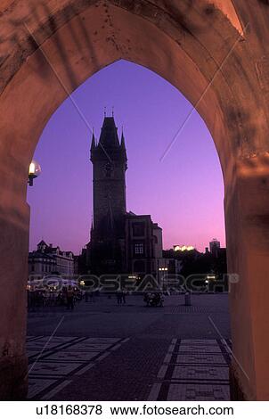 Prague, Praha, Czech Republic, Central Bohemia, View from an arch of Old Town Hall in Old Town Square in the city of Prague at night. View Large Photo Image Stock Photo - Prague, Praha, Czech Republic, Central Bohemia, View from an arch of Old Town Hall in Old Town Square in the city of Prague at night.. Fotosearch