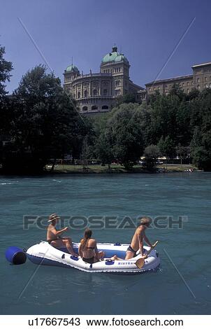 rafting, Switzerland, Berne, Bern, Rafting down the Aare River with Bundeshaus the Federal Parliament Building in the background in the capital city of Bern. View Large Photo Image Stock Image - rafting, Switzerland, Berne, Bern, Rafting down the Aare River with Bundeshaus the Federal Parliament Building in the background in the capital city of Bern.. Fotosearch