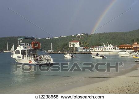 rainbow, St. John, U. S. Virgin Islands, Caribbean, USVI, Rainbow over Cruz Bay on Saint John Island. View Large Photo Image Stock Photo - rainbow, St. John, U. S. Virgin Islands, Caribbean, USVI, Rainbow over Cruz Bay on Saint John Island.. Fotosearch