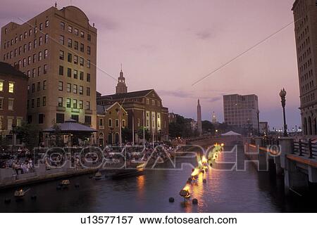Stock Photo -  RI, Providence, Rhode Island, Waterfire Providence along Providence River in downtown Providence at night.. Fotosearch