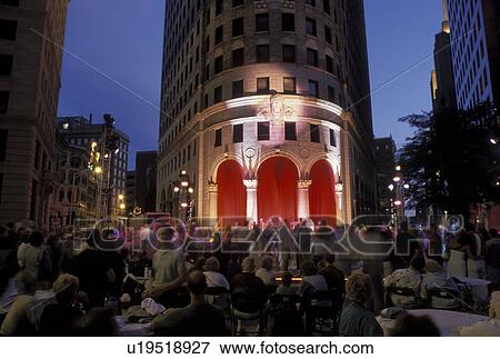 Stock Photo -  RI, Providence, Rhode Island, Waterfire Providence in downtown Providence in the evening.. Fotosearch
