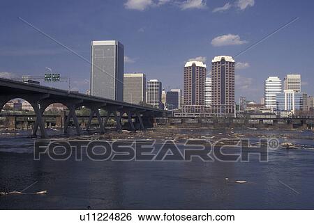 Richmond, VA, Virginia, Skyline of downtown Richmond. Manchester Bridge spans the James River. View Large Photo Image Stock Photograph - Richmond, VA, Virginia, Skyline of downtown Richmond. Manchester Bridge spans the James River.. Fotosearch