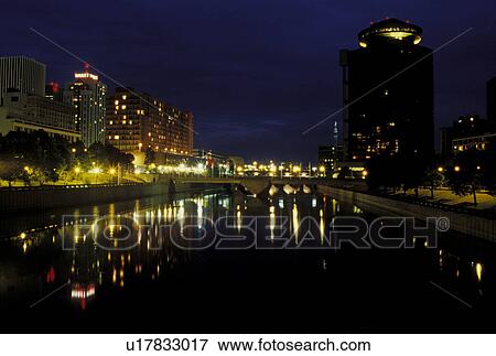 Rochester, New York, NY, Reflection of the skyline of downtown Rochester in the Genesee River in the evening. View Large Photo Image Stock Photo - Rochester, New York, NY, Reflection of the skyline of downtown Rochester in the Genesee River in the evening.. Fotosearch