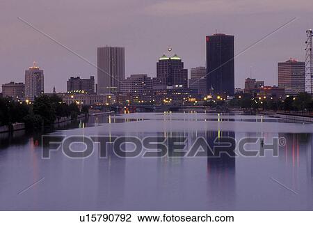 Rochester, NY, New York, Reflection of the skyline of downtown Rochester in the Genesee River in the evening. View Large Photo Image Stock Image - Rochester, NY, New York, Reflection of the skyline of downtown Rochester in the Genesee River in the evening.. Fotosearch