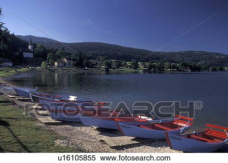 rowboat, Vallee de Joux, Switzerland, Vaud, Red and blue wooden rowboats, beach, Lac de Joux, Le Pont, Jura mountain region. View Large Photo Image Stock Photography - rowboat, Vallee de Joux, Switzerland, Vaud, Red and blue wooden rowboats, beach, Lac de Joux, Le Pont, Jura mountain region.. Fotosearch