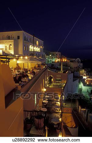 Santorini, Cyclades, Greece, Greek Islands, Fira, Europe, Village of Fira at night on the steep hillside of Santorini Island on the Aegean Sea. View Large Photo Image Stock Image - Santorini, Cyclades, Greece, Greek Islands, Fira, Europe, Village of Fira at night on the steep hillside of Santorini Island on the Aegean Sea.. Fotosearch