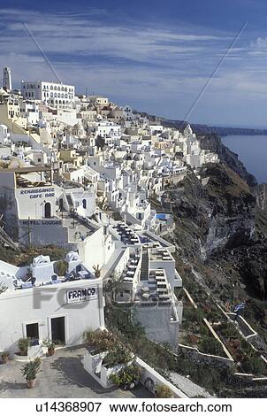 Santorini, Cyclades, Greek Islands, Fira, Greece, Europe, Whitewashed buildings in the village of Fira on the steep hillside of Santorini Island on the Aegean Sea. View Large Photo Image Stock Photo - Santorini, Cyclades, Greek Islands, Fira, Greece, Europe, Whitewashed buildings in the village of Fira on the steep hillside of Santorini Island on the Aegean Sea.. Fotosearch