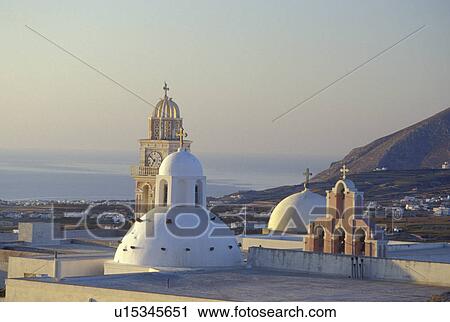 Santorini, Greek Islands, Fira, Cyclades, Greece, Europe, Scenic view of church steeples in the village of Fira on Santorini Island on the Aegean Sea. View Large Photo Image Stock Image - Santorini, Greek Islands, Fira, Cyclades, Greece, Europe, Scenic view of church steeples in the village of Fira on Santorini Island on the Aegean Sea. . Fotosearch