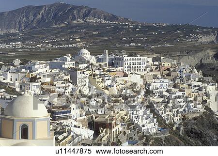 Stock Photography -  Santorini, Greek Islands, Fira, Cyclades, Greece, Europe, Scenic view of the village of Fira on the steep hillside of Santorini Island on the Aegean Sea.. Fotosearch