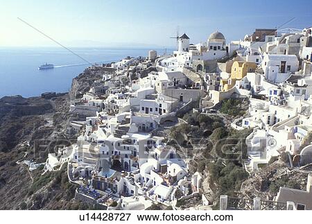 Santorini, Greek Islands, Greece, Oia, Cyclades, Europe, Village of Oia on the steep hillside of Santorini Island on the Aegean Sea. View of ferry coming into the harbor. View Large Photo Image Stock Photo - Santorini, Greek Islands, Greece, Oia, Cyclades, Europe, Village of Oia on the steep hillside of Santorini Island on the Aegean Sea. View of ferry coming into the harbor.. Fotosearch