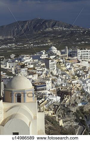 Stock Photo -  Santorini, Greek Islands, Greece, Fira, Cyclades, Europe, Scenic view of the village of Fira on the steep hillside of Santorini Island on the Aegean Sea.. Fotosearch