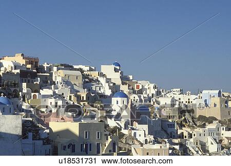 Santorini, Greek Islands, Oia, Cyclades, Greece, Europe, Village of Oia on the steep hillside of Santorini Island. View Large Photo Image Stock Image - Santorini, Greek Islands, Oia, Cyclades, Greece, Europe, Village of Oia on the steep hillside of Santorini Island.. Fotosearch