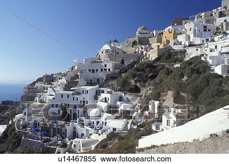 Santorini, Greek Islands, Oia, Cyclades, Greece, Europe, Village of Oia on the steep hillside of Santorini Island on the Aegean Sea. View Large Photo Image Stock Photography - Santorini, Greek Islands, Oia, Cyclades, Greece, Europe, Village of Oia on the steep hillside of Santorini Island on the Aegean Sea.. Fotosearch