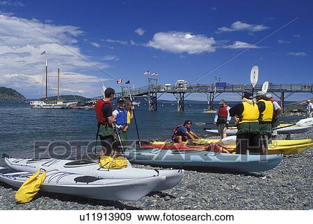 sea kayak, Bar Harbor, ME, Mount Desert Island, Maine, Sea kayaking lesson on the shore of Frenchman Bay in Bar Harbor on the Atlantic Ocean. View Large Photo Image Stock Photo - sea kayak, Bar Harbor, ME, Mount Desert Island, Maine, Sea kayaking lesson on the shore of Frenchman Bay in Bar Harbor on the Atlantic Ocean.. Fotosearch