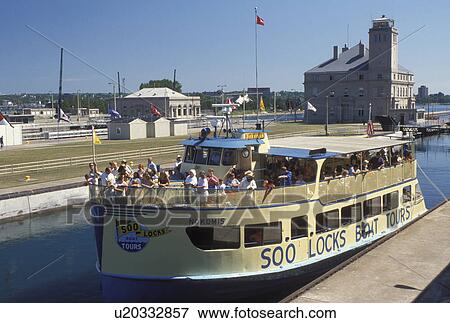 Soo Locks, Sault Ste. Marie, MI, Michigan, Upper Peninsula, U. P UP, Soo Locks Tourboat at the Soo Locks along St. Marys River in Sault Sainte Marie. View Large Photo Image Stock Photo - Soo Locks, Sault Ste. Marie, MI, Michigan, Upper Peninsula, U. P UP, Soo Locks Tourboat at the Soo Locks along St. Marys River in Sault Sainte Marie.. Fotosearch