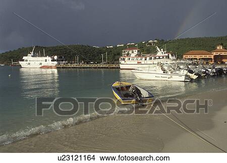 St. John, U. S. Virgin Islands, Caribbean, USVI, Rainbow over Cruz Bay on Saint John Island. View Large Photo Image Picture - St. John, U. S. Virgin Islands, Caribbean, USVI, Rainbow over Cruz Bay on Saint John Island.. Fotosearch