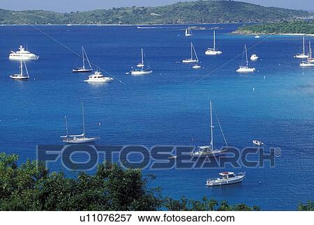 St. John, U. S. Virgin Islands, Caribbean, USVI, Scenic view of boats buoyed in Caneel Bay on Saint John Island. View Large Photo Image Stock Photo - St. John, U. S. Virgin Islands, Caribbean, USVI, Scenic view of boats buoyed in Caneel Bay on Saint John Island.. Fotosearch