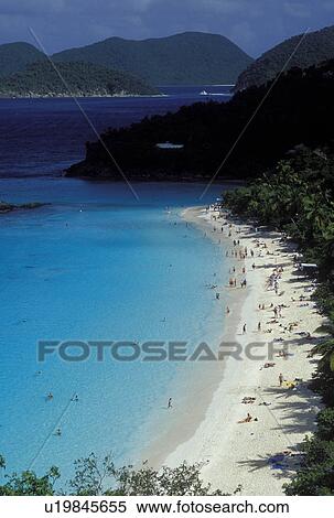 Stock Photography -  St. John, Virgin Islands National Park, U. S. Virgin Islands, Caribbean, USVI, Scenic view of Trunk Bay Beach and people on the beach in Virgin Islands Nat'l Park on Saint John Island.. Fotosearch