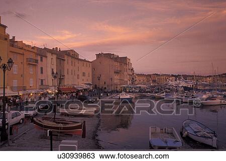 St. Tropez, France, Cote d' Azur, Provence, Var, Europe, View of the waterfront along the harbor of Saint Tropez at sunset on the Mediterranean Sea. View Large Photo Image Stock Image - St. Tropez, France, Cote d' Azur, Provence, Var, Europe, View of the waterfront along the harbor of Saint Tropez at sunset on the Mediterranean Sea.. Fotosearch
