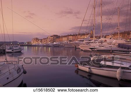 St. Tropez, France, sunset, harbor, Cote d' Azur, Provence, Var, Europe, Yachts docked in the harbor of Saint Tropez at sunset on the Mediterranean Sea. View Large Photo Image Stock Image - St. Tropez, France, sunset, harbor, Cote d' Azur, Provence, Var, Europe, Yachts docked in the harbor of Saint Tropez at sunset on the Mediterranean Sea.. Fotosearch