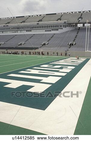 Stock Photography -  stadiun, MSU, East Lansing, MI, Michigan, Football team practicing at Spartans Football Stadium on the campus of Michigan State University.. Fotosearch