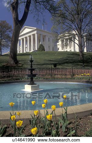 Stock Image -  State Capitol, Richmond, VA, State House, Virginia, Fountain on Capitol Square at The Virginia State Capitol in the spring in the capital city of Richmond.. Fotosearch