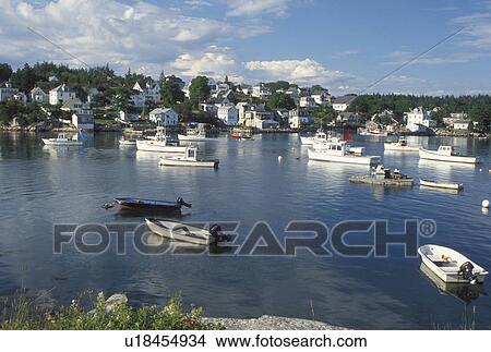 Stonington, ME, Maine, Deer Isle, Lobster boats buoyed in the harbor of the lobstering village of Stonington on Deer Isle on the Atlantic Ocean. View Large Photo Image Picture - Stonington, ME, Maine, Deer Isle, Lobster boats buoyed in the harbor of the lobstering village of Stonington on Deer Isle on the Atlantic Ocean.. Fotosearch