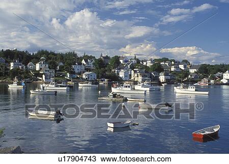 Stonington, ME, Maine, Deer Isle, Lobster boats buoyed in the harbor of the lobstering village of Stonington on Deer Isle on the Atlantic Ocean. View Large Photo Image Stock Image - Stonington, ME, Maine, Deer Isle, Lobster boats buoyed in the harbor of the lobstering village of Stonington on Deer Isle on the Atlantic Ocean.. Fotosearch