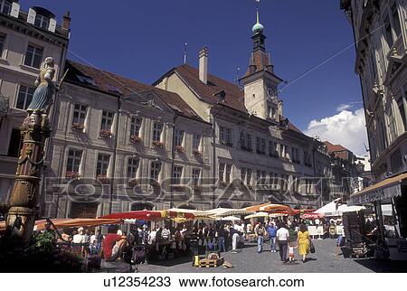 Stock Image -  street market, Switzerland, Lausanne, Vaud, Market day in Place de la Palud in the city of Lausanne.. Fotosearch