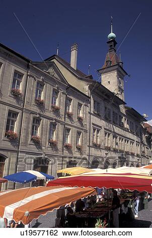 Stock Image -  street market, Switzerland, Lausanne, Vaud, Market day in Place de la Palud in the city of Lausanne.. Fotosearch