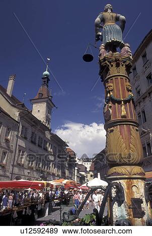 Stock Photo -  street market, Switzerland, Lausanne, Vaud, Market day in Place de la Palud in the city of Lausanne.. Fotosearch