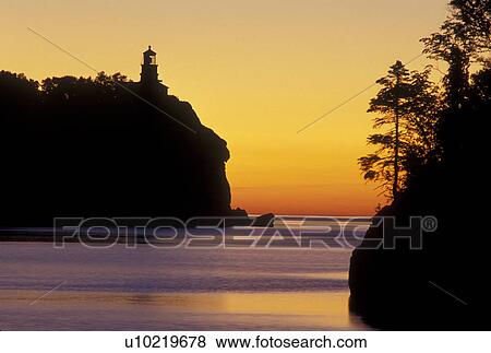 sunrise, lighthouse, Lake Superior, North Shore Drive, Two Harbors, MN, Minnesota, Split Rock Lighthouse situated on a high cliff on the north shore of Lake Superior at Split Rock Lighthouse State Park in Two Harbors at sunrise. View Large Photo Image Stock Photo - sunrise, lighthouse, Lake Superior, North Shore Drive, Two Harbors, MN, Minnesota, Split Rock Lighthouse situated on a high cliff on the north shore of Lake Superior at Split Rock Lighthouse State Park in Two Harbors at sunrise.. Fotosearch