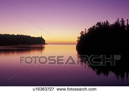 sunrise, lighthouse, Lake Superior, North Shore Drive, Two Harbors, MN, Minnesota, Split Rock Lighthouse situated on a high cliff on the north shore of Lake Superior at Split Rock Lighthouse State Park in Two Harbors at sunrise. View Large Photo Image Stock Photo - sunrise, lighthouse, Lake Superior, North Shore Drive, Two Harbors, MN, Minnesota, Split Rock Lighthouse situated on a high cliff on the north shore of Lake Superior at Split Rock Lighthouse State Park in Two Harbors at sunrise.. Fotosearch