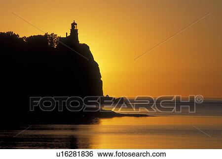 sunrise, MN, Two Harbors, Lake Superior, North Shore Drive, Minnesota, Split Rock Lighthouse situated on a high cliff on the north shore of Lake Superior at Split Rock Lighthouse State Park in Two Harbors at sunrise. View Large Photo Image Stock Photograph - sunrise, MN, Two Harbors, Lake Superior, North Shore Drive, Minnesota, Split Rock Lighthouse situated on a high cliff on the north shore of Lake Superior at Split Rock Lighthouse State Park in Two Harbors at sunrise.. Fotosearch
