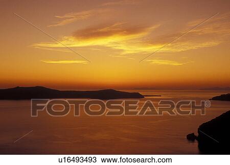 sunset, Santorini, Greek Islands, Cyclades, Greece, Europe, Sunset overlooking the Aegean Sea from Santorini Island. View Large Photo Image Stock Image - sunset, Santorini, Greek Islands, Cyclades, Greece, Europe, Sunset overlooking the Aegean Sea from Santorini Island.. Fotosearch