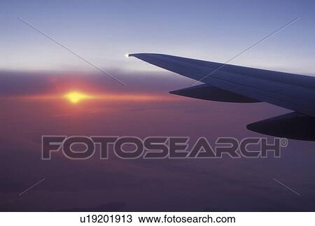 sunset, wing, plane, Caribbean, American Airlines View Large Photo Image Stock Image - sunset, wing, plane, Caribbean, American Airlines. Fotosearch