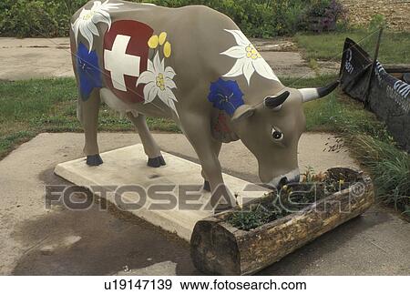 Stock Photo -  swiss cow, Little Switzerland, New Glarus, WI, Wisconsin, Painted swiss cow in the town of New Glarus.. Fotosearch